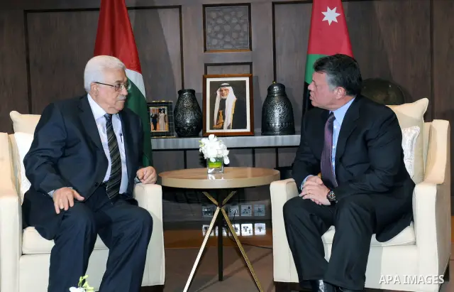 Palestinian President Mahmoud Abbas (Abu Mazen) meets with the King Abdullah II in the Jordanian capital of Amman on Jan. 25, 2012. Photo by Thaer Ganaim