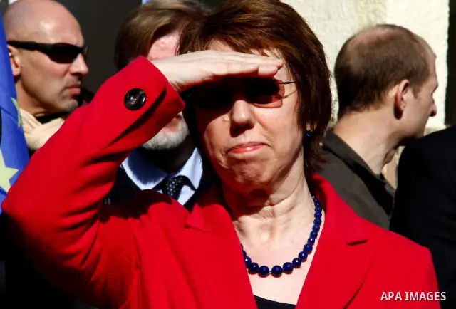EU Foreign Policy Chief Catherine Ashton shields her eyes from the sun as she visits the UN Relief and Works Agency (UNRWA), in Gaza City , on January 25, 2012. Ashton said that the informal talks between Israel and the...