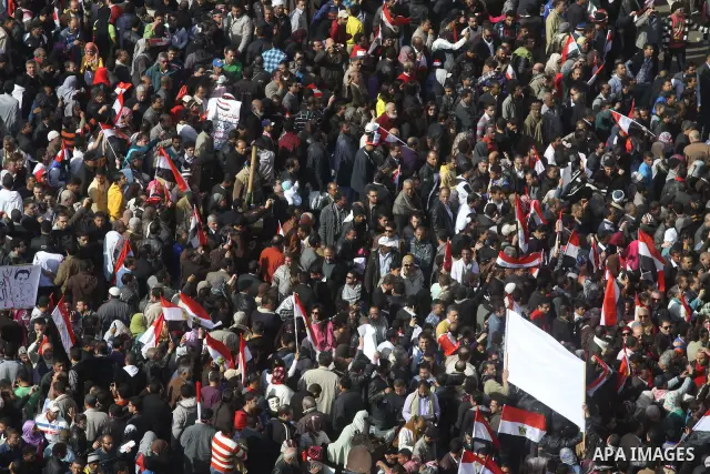Egyptian demonstrators gather to celebrate the one year anniversary of the 25th January uprising at Tahrir square in Cairo, Egypt, 25 January 2012. One year earlier the same day Egyptians started an uprising which result...