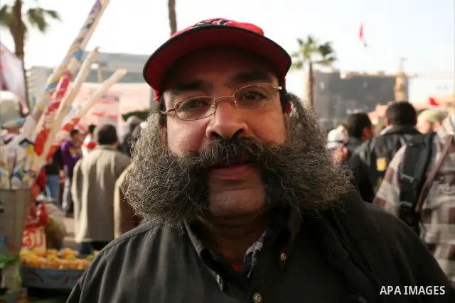 Egyptian demonstrators gather to celebrate the one year anniversary of the 25th January uprising at Tahrir square in Cairo, Egypt, 25 January 2012. One year earlier the same day Egyptians started an uprising which result...