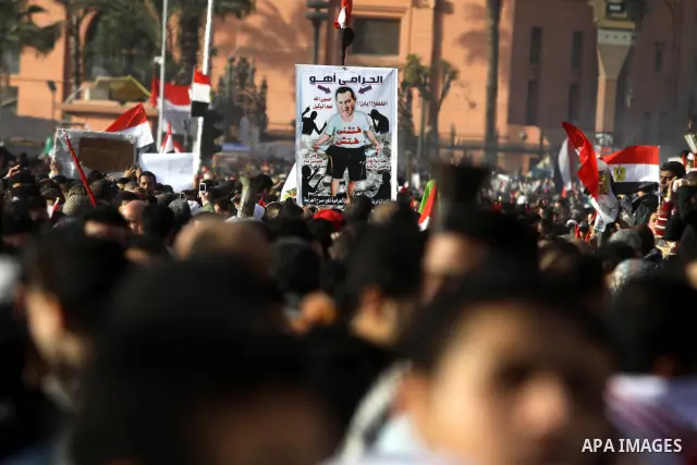 Egyptian demonstrators gather to celebrate the one year anniversary of the 25th January uprising at Tahrir square in Cairo, Egypt, 25 January 2012. One year earlier the same day Egyptians started an uprising which result...