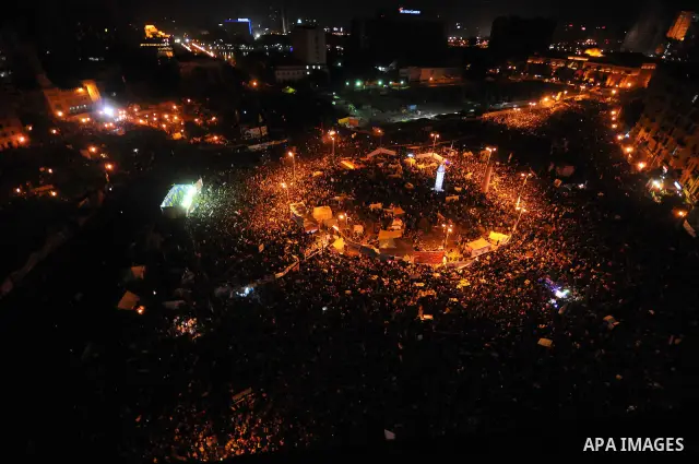 Egyptian demonstrators gather during a rally in Tahrir Square to mark the one year anniversary of the uprising that ousted President Hosni Mubarak in Cairo, Egypt, Wednesday, Jan. 25, 2012. Crowds of several hundred thou...