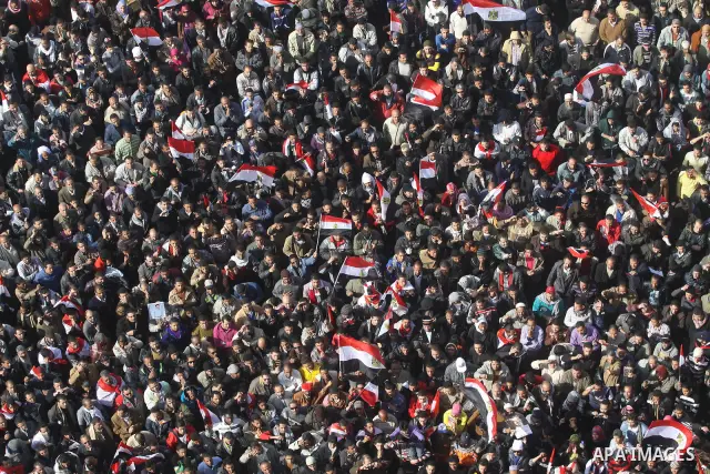 Egyptian demonstrators gather to celebrate the one year anniversary of the 25th January uprising at Tahrir square in Cairo, Egypt, 25 January 2012. One year earlier the same day Egyptians started an uprising which result...