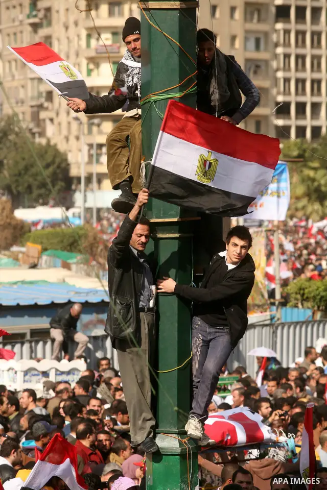 Egyptian demonstrators gather to celebrate the one year anniversary of the 25th January uprising at Tahrir square in Cairo, Egypt, 25 January 2012. One year earlier the same day Egyptians started an uprising which result...
