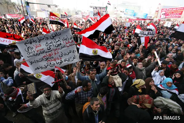 Egyptian demonstrators gather to celebrate the one year anniversary of the 25th January uprising at Tahrir square in Cairo, Egypt, 25 January 2012. One year earlier the same day Egyptians started an uprising which result...