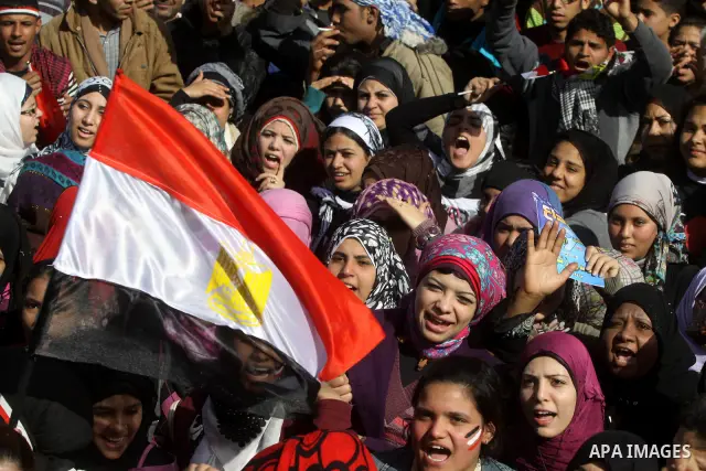 Demonstrators take part in a protest at Tahrir square in Cairo January 26, 2012. Scores of Egyptian youth protesters marking the one-year anniversary of the uprising that ousted Hosni Mubarak bedded down in Tahrir Square...