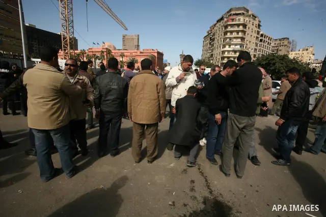 Egyptian demonstrators gather during a protest demanding the army to hand power to civilians at Tahrir square in Cairo on January 27, 2012, a year after a popular uprising. The protesters are demanding the implementation...