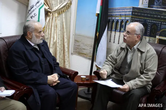 The spokesman of the Palestinian parliament, Ahmed Bahr, listens to complaints the palestinian Citizens', in Gaza City, on Jan 28. 2012. Photo by Mohammed Asad