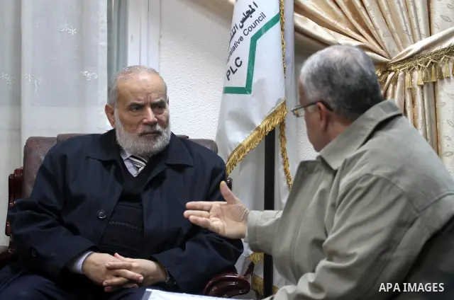 The spokesman of the Palestinian parliament, Ahmed Bahr, listens to complaints the palestinian Citizens', in Gaza City, on Jan 28. 2012. Photo by Mohammed Asad