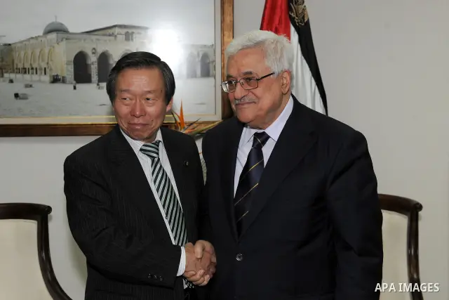 Palestinian President Mahmoud Abbas (Abu Mazen) meets with Deputy Minister of Foreign Affairs of Japan, Ryuji Yamane in the West Bank city of Ramallah January 28, 2012. Photo by Thaer Ganaim