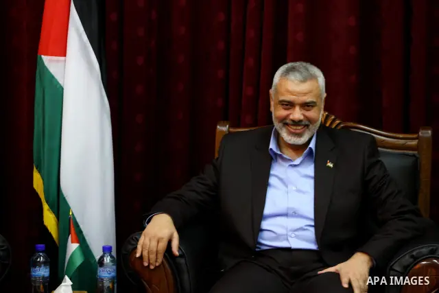 Palestinian Prime Minister in Gaza Strip, Ismail Haniya Meet with the head of Central Elections Committee, Hanna Nasser, in Gaza city, on Jan. 29, 2012. Photo by Ashraf Amra