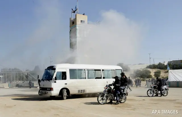 Hamas police officers display their skills during a graduation ceremony from a military course in the southern Gaza Strip city of Khan Yunis on January 29, 2012. Photo by Abed Rahim Khatib