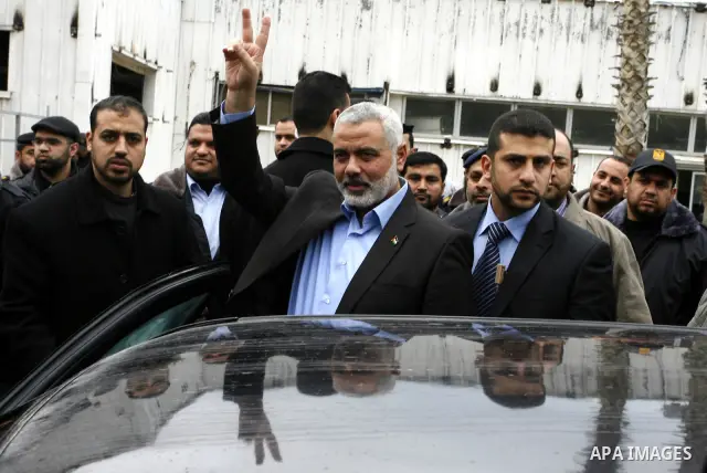 Palestinian Prime Minister in Gaza Strip, Ismail Haniya, arrived to the Rafah border crossing in the southern Gaza Strip on Jan. 30, 2012. as he leaves on a regional tour expected to include stops in Iran, Qatar and Bahr...