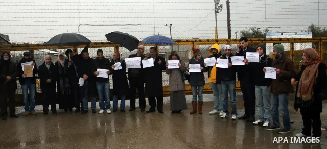A Palestinian demonstrator shouts slogans during a protest in support of jailed Islamic Jihad spokesman Khodr Adnan outside Israel's Ofer prison near the West Bank town of Betunia on January 30, 2012. Adnan has been on h...