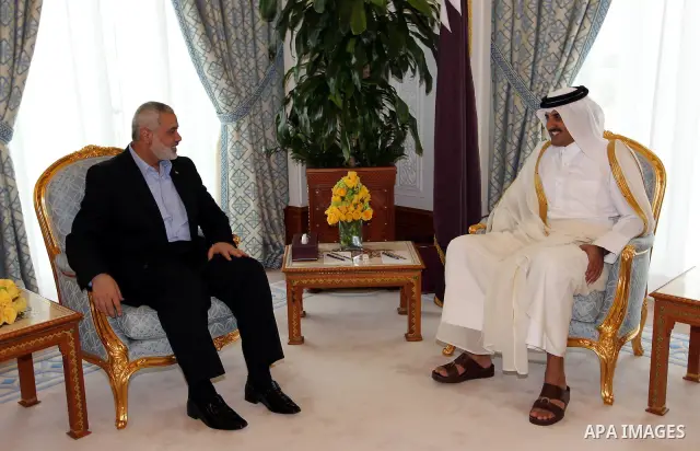Palestinian Prime Minister in Gaza Strip, Ismail Haniyah meets with Crown Prince of Qatari, in the Qatari capital of Doha on Feb. 01, 2012. Photo by Mohammed Al-Ostaz.