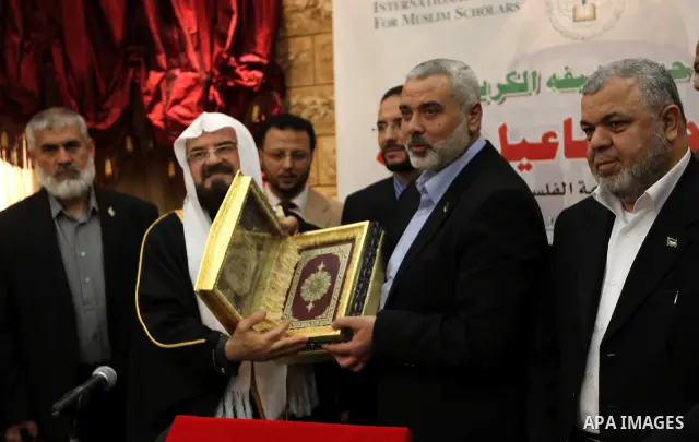 Palestinian Prime Minister in Gaza Strip, Ismail Haniyah, speaks during a meeting at the International Union for Muslim Scholars in the Qatari capital Doha on Feb. 01, 2012. Haniya is on the first leg of a regional tour...