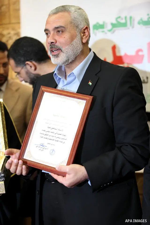 Palestinian Prime Minister in Gaza Strip, Ismail Haniyah, speaks during a meeting at the International Union for Muslim Scholars in the Qatari capital Doha on Feb. 01, 2012. Haniya is on the first leg of a regional tour...