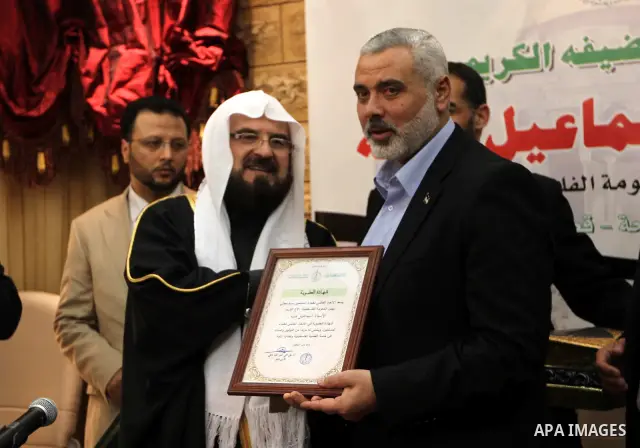 Palestinian Prime Minister in Gaza Strip, Ismail Haniyah, speaks during a meeting at the International Union for Muslim Scholars in the Qatari capital Doha on Feb. 01, 2012. Haniya is on the first leg of a regional tour...