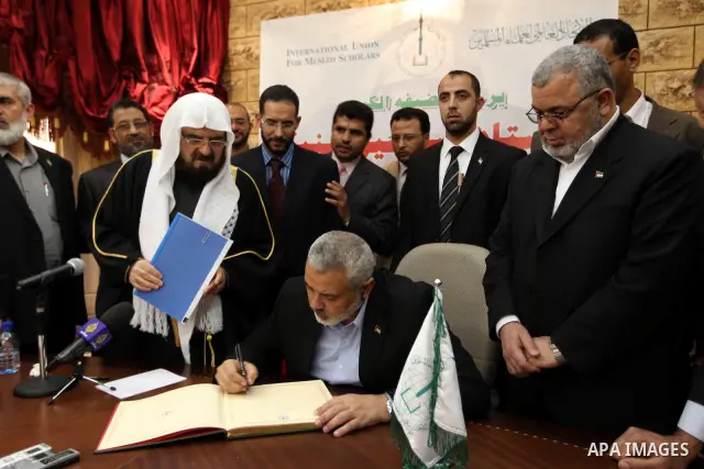 Palestinian Prime Minister in Gaza Strip, Ismail Haniyah, speaks during a meeting at the International Union for Muslim Scholars in the Qatari capital Doha on Feb. 01, 2012. Haniya is on the first leg of a regional tour...