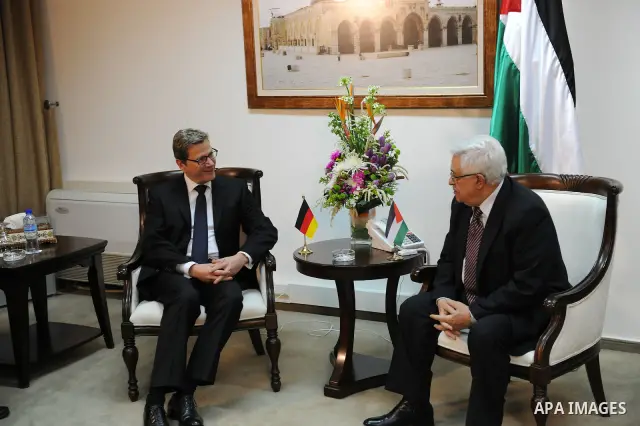 Palestinian President Mahmoud Abbas (R) meets with Germany's Foreign Minister Guido Westerwelle in the West Bank city of Ramallah, 01 February 2012. Photo by Thaer Ghanaim