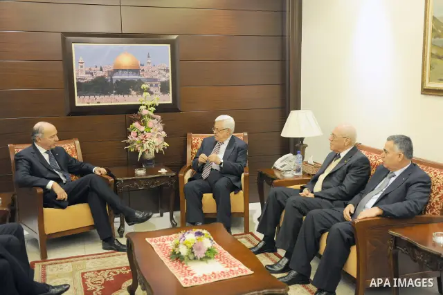 Palestinian President Mahmoud Abbas (Abu Mazen) meets with former French Prime Minister Laurent Fabius, in the West Bank city of Ramallah On feb. 03, 2012. Photo by Thaer Ganaim.