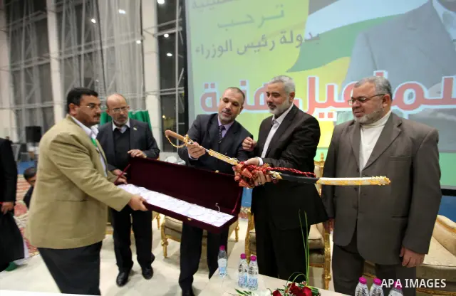Palestinian Prime Minister in Gaza Strip, Ismail Haniyah during a ceremony organized by the Palestinian community in the Qatari capital of Doha on Feb. 02, 2012. Photo by Mohammed Al-Ostaz