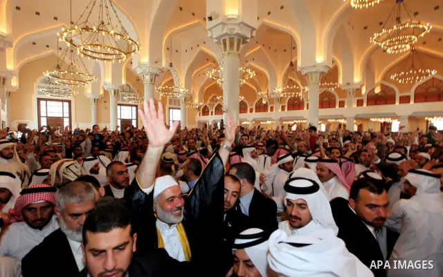 Palestinian Prime Minister in Gaza Strip, Ismail Haniyah, attend Friday prayers in the mosque of Muhammad ibn Abed al-Wahhab in the Qatari capital of Doha on Feb. 03, 2012. Photo by Mohammed Al-Ostaz