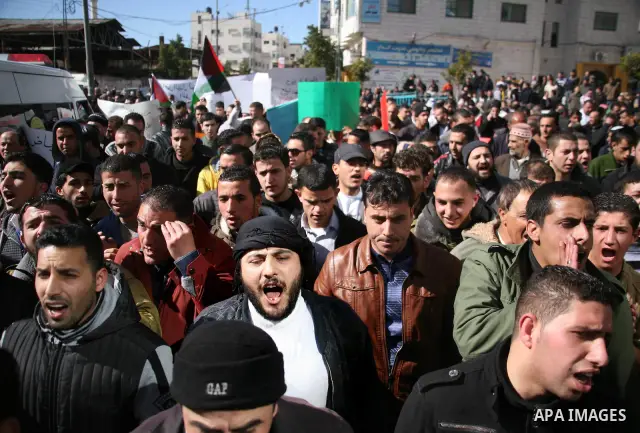 Palestinians protest against rising prices and taxes in the West Bank city of Hebron. Saturday, Feb. 4, 2012. Palestinian Authority Prime Minister Salam Fayyad has sparked a furor with a push to get Palestinians to pay m...