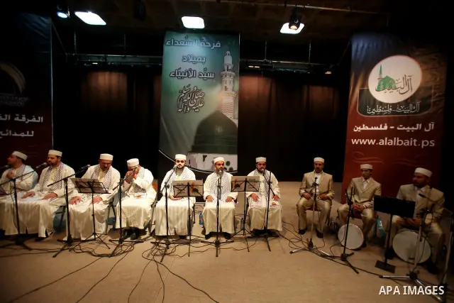 Palestinians attend a festival marking the birthday of Prophet Mohammad in Gaza City February 4, 2012. Photo by Ashraf Amra