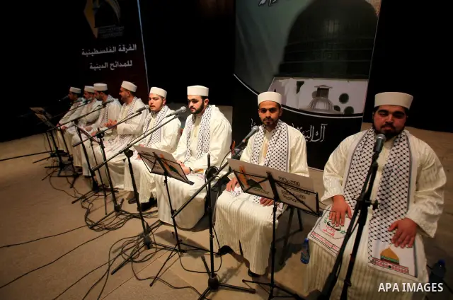 Palestinians attend a festival marking the birthday of Prophet Mohammad in Gaza City February 4, 2012. Photo by Ashraf Amra