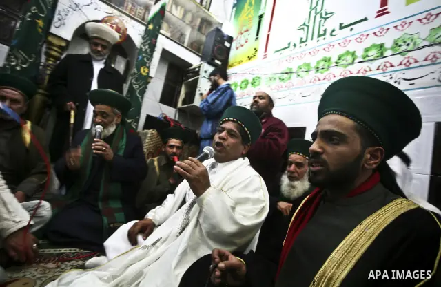 Members of a palestinian Sufi Muslim group play traditional instruments during the birthday of Prophet Mohammad, in Al-Nusirat refugee camp on 04 February 2012. Muslims across the world celebrated the birth of the Prophe...