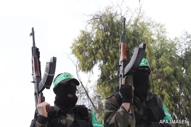 Members of Al-Qassam Brigades take part in a funeral for Hamas fighter in Gaza City, on Feb, 06. 2012. Photo by Mohammed Asad