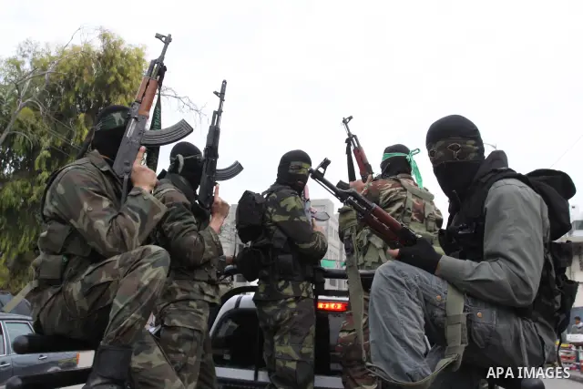 Members of Al-Qassam Brigades take part in a funeral for Hamas fighter in Gaza City, on Feb, 06. 2012. Photo by Mohammed Asad