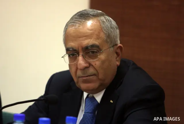 Palestinian prime minister Salam Fayyad is seen on February 6, 2012, in the West Bank city of Ramallah after it was agreed that Palestinian president Mahmud Abbas is to head an interim consensus government under a deal s...