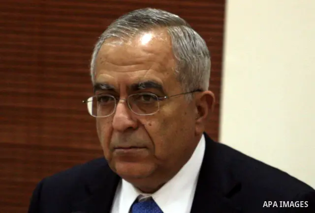 Palestinian prime minister Salam Fayyad is seen on February 6, 2012, in the West Bank city of Ramallah after it was agreed that Palestinian president Mahmud Abbas is to head an interim consensus government under a deal s...