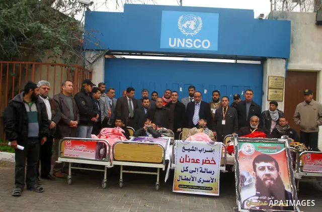 Palestinians on a hunger strike in solidarity with the prisoners in Israeli jails in front of the UN headquarters in Gaza City, on Feb. 07, 2012. Photo by Ashraf Amra