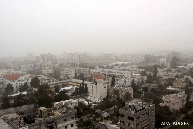 A general view Shows the parameters of Gaza City during cold winds and sand storms on Feb. 07, 2012. Photo by Mohammed Asad