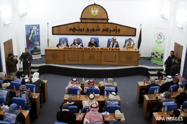 The spokesman of the Palestinian parliament, Ahmed Bahr meets with members of the "Miles of Smiles 9" aid convoy at the parliament headquarters in Gaza city on Feb. 07, 2012. The convoy, carrying medical aid for the Pale...