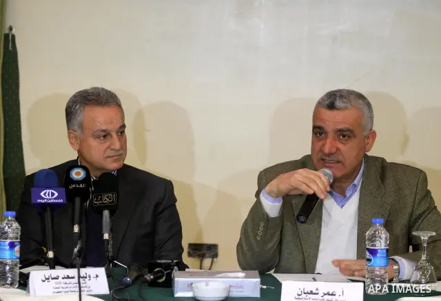 Foundation pal Thenik meets with Executive director of electricity company Walid Saad Sayel, during conference press in Gaza City, On Feb. 08, 2012. Photo by Mohammed Asad