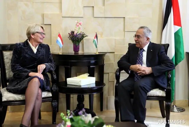 Palestinian Prime Minister, Salam Fayyad, receives the Minister of Development and International Cooperation of Luxembourg Maria Jose Jacob in the West Bank city of Ramallah, on Feb. 08, 2012. Photo by Mustafa Abu Dayeh
