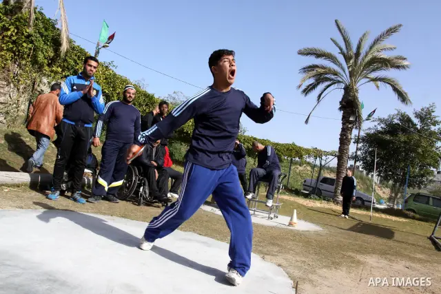 Disabled Palestinians participate in an athletics championship for disabled , in Gaza city on Feb. 09, 2012. Photo by Mohammed Asad