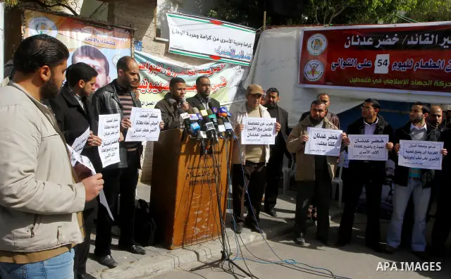 Palestinians protest of prisoner Khader Adnan, who has been on hunger strike since December 18 while being held in an Israeli jail, in Gaza city on Feb. 09, 2012. Photo by Ashraf Amra