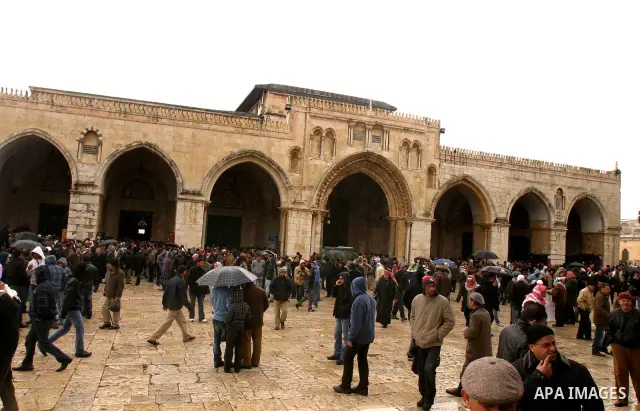 Palestinians attend Friday prayers at the Al-Aqsa Mosque compound in Jerusalem's Old City on February 10, 2012. Photo by Mahfouz Abu Turk
