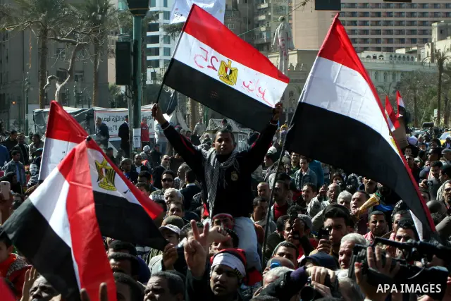 Demonstrators take part in a protest demanding that the army to hand power over to civilians, near the defence ministry in Cairo February 10, 2012. Egypt's religious authorities called on unions and youth groups to scrap...