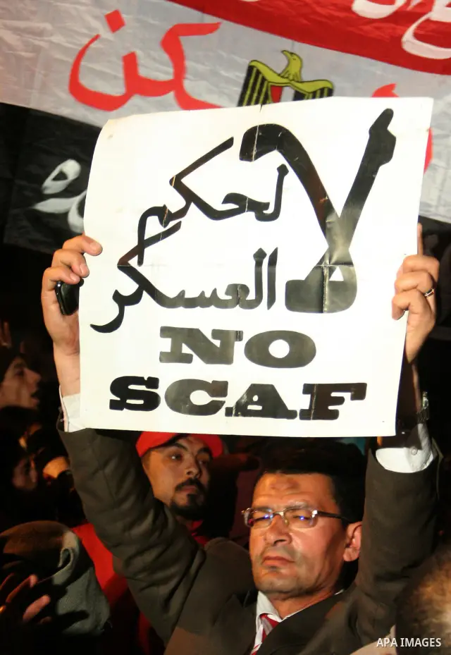 Demonstrators take part in a protest demanding that the army to hand power over to civilians, near the defence ministry in Cairo February 10, 2012. Egypt's religious authorities called on unions and youth groups to scrap...