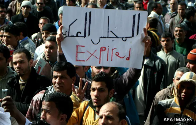 Demonstrators take part in a protest demanding that the army to hand power over to civilians, near the defence ministry in Cairo February 10, 2012. Egypt's religious authorities called on unions and youth groups to scrap...