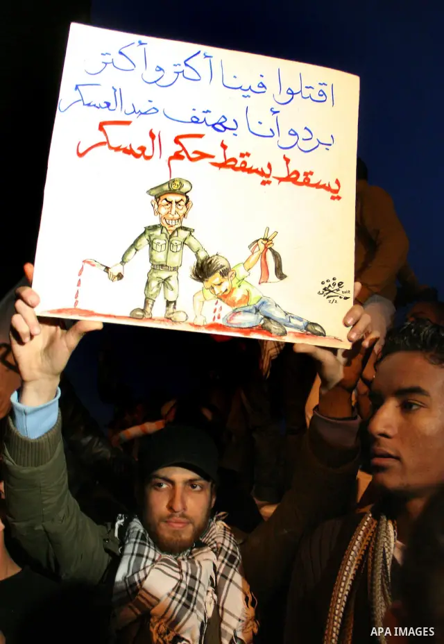 Demonstrators take part in a protest demanding that the army to hand power over to civilians, near the defence ministry in Cairo February 10, 2012. Egypt's religious authorities called on unions and youth groups to scrap...
