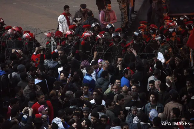 Demonstrators take part in a protest demanding that the army to hand power over to civilians, near the defence ministry in Cairo February 10, 2012. Egypt's religious authorities called on unions and youth groups to scrap...