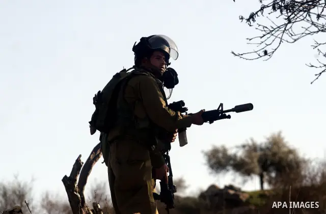 Israeli security officers fire tear gas canisters during clashes with stone-throwing Palestinian demonstrators at a protest held in solidarity with prisoner Khader Adnan, a member of the Islamic Jihad militant group, out...