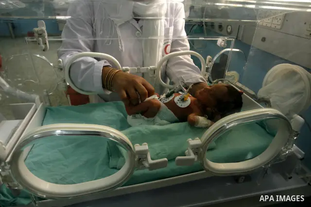 Premature babies receive treatment in the Nasser hospital in Khan Younis, southern Gaza Strip on February 15, 2012 as the hospital suffer from running out of fuel. Palestinian Ministry of Health in Gaza, calls for the Ar...